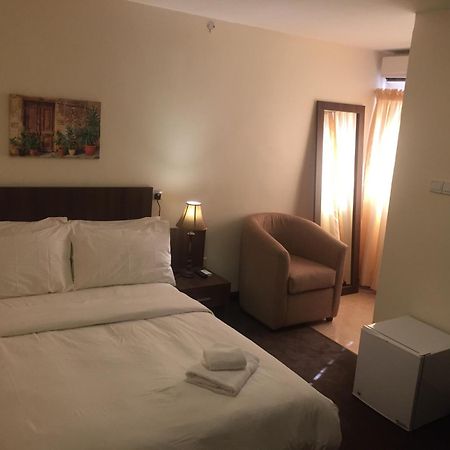 Sinclair Guest House Abuja Rom bilde