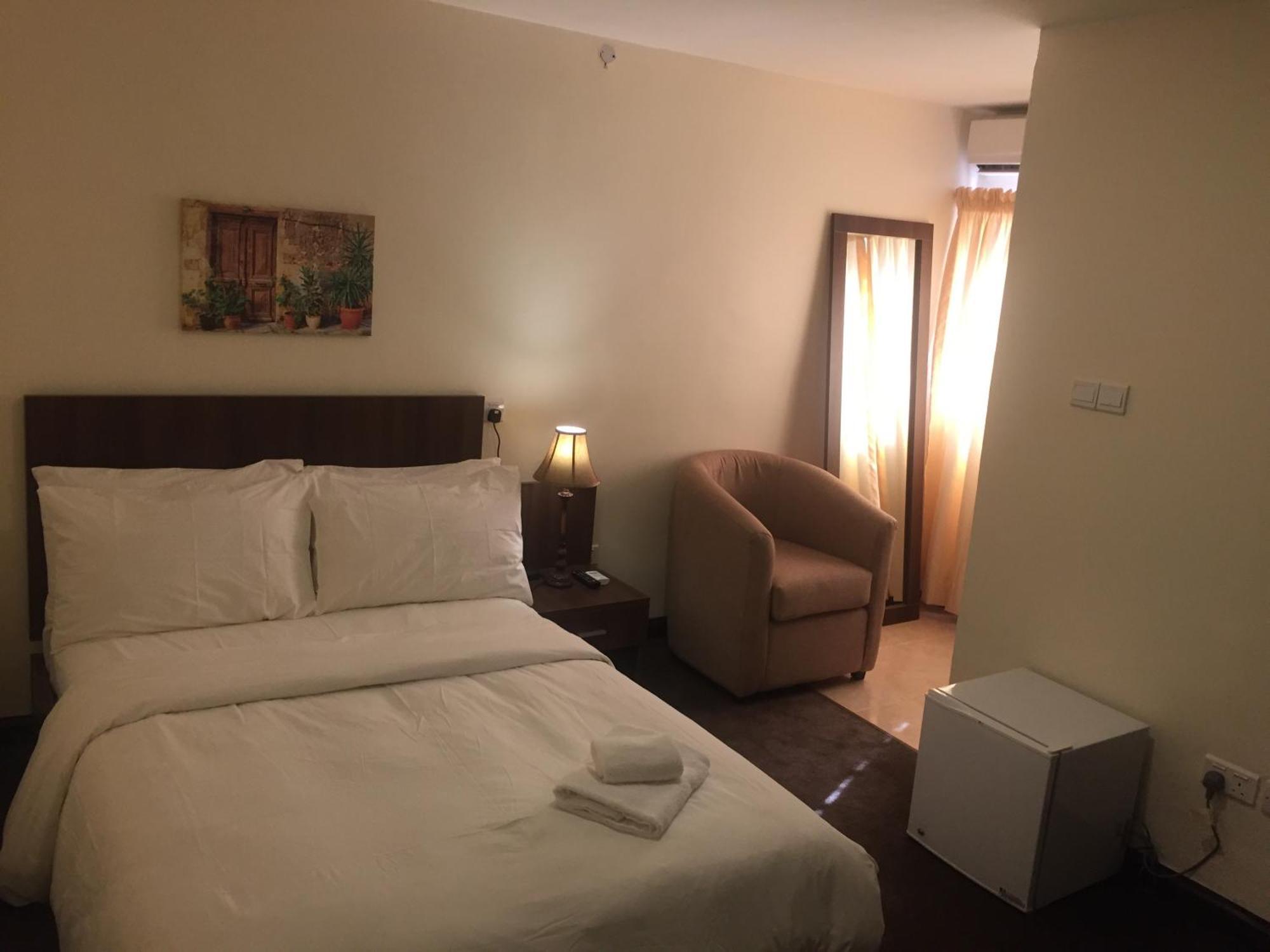 Sinclair Guest House Abuja Rom bilde